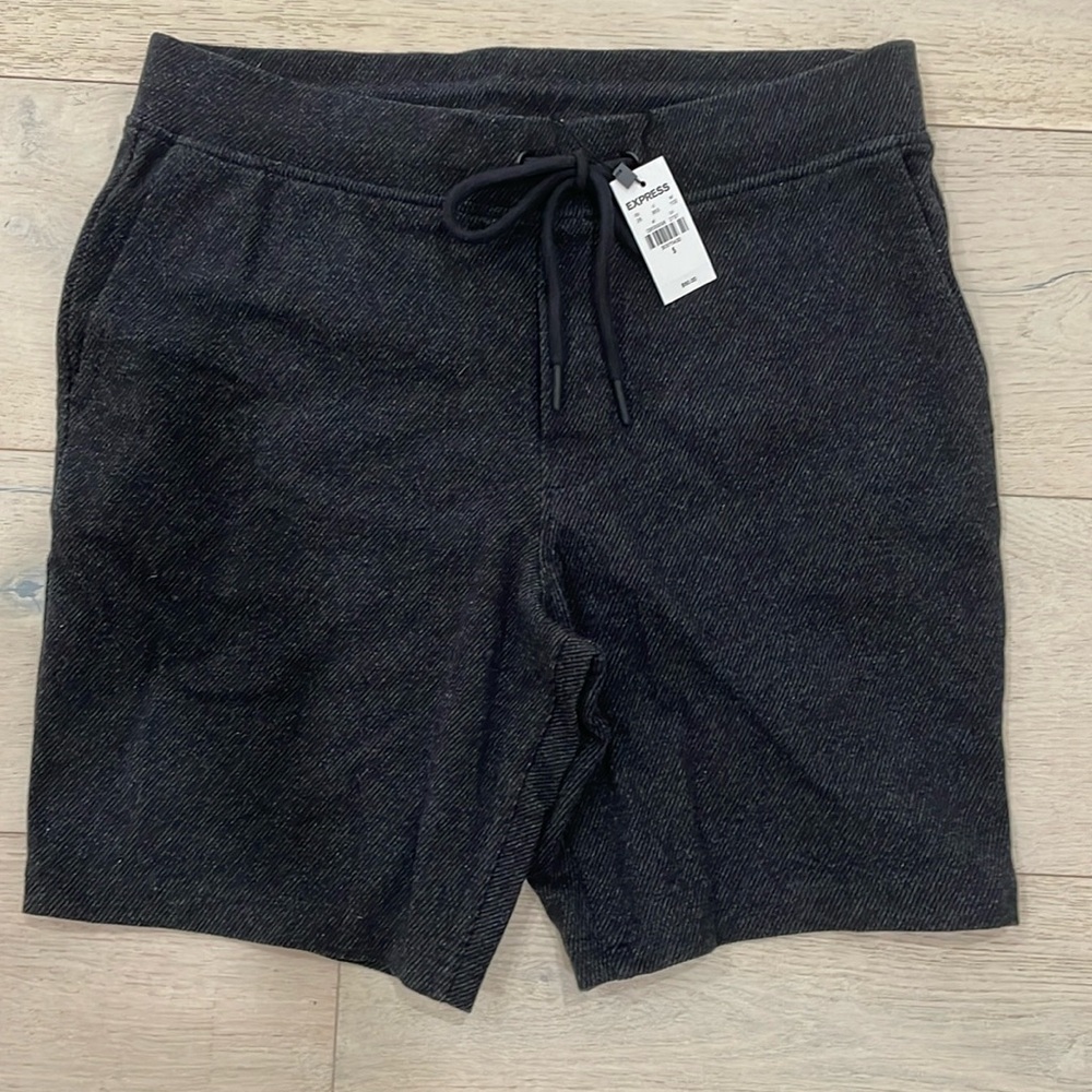 New with tags. Men’s Express black casual shorts. Size small